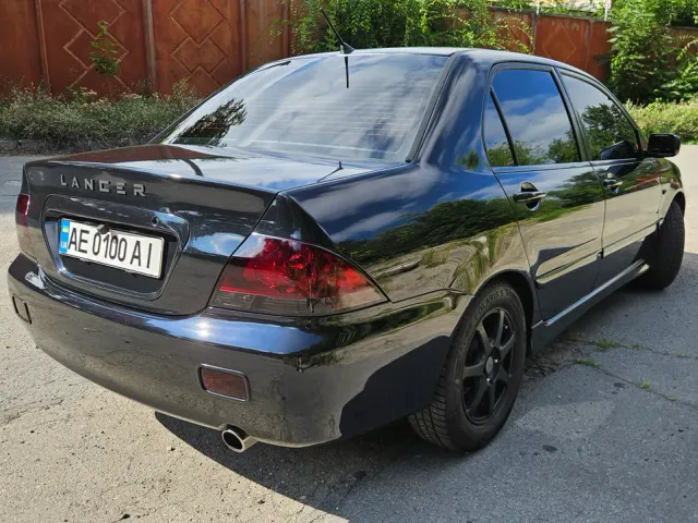 Mitsubishi Lancer - фото 3