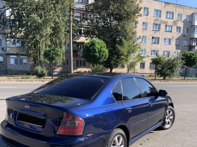 Subaru Legacy - фото 2