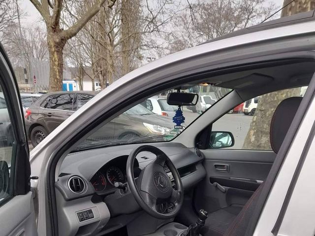 Mazda 2 - фото 5