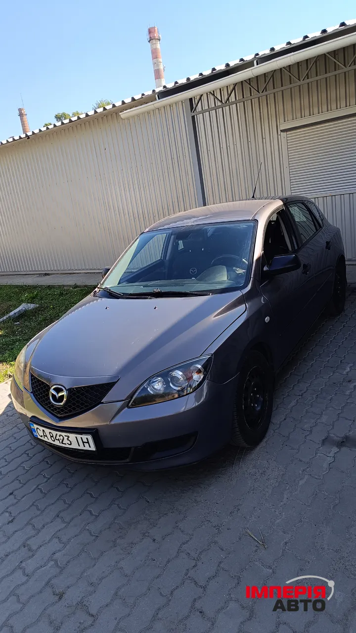 Mazda 3 - фото 1