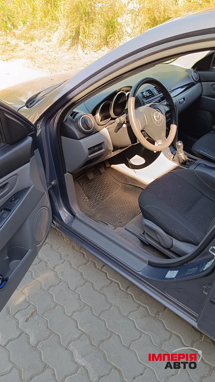 Mazda 3 - фото 9