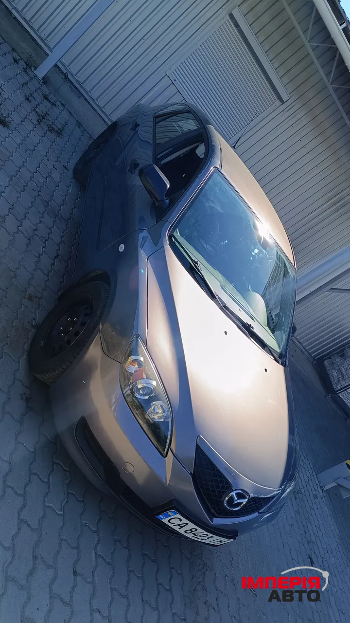 Mazda 3 - фото 2