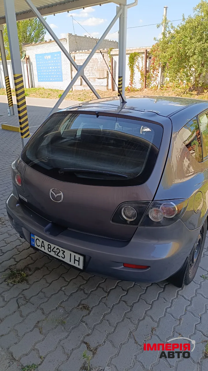 Mazda 3 - фото 4