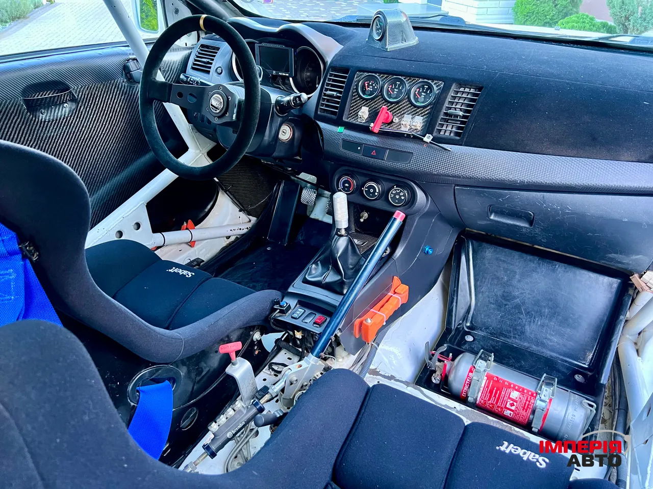 Mitsubishi Lancer Evolution - фото 9