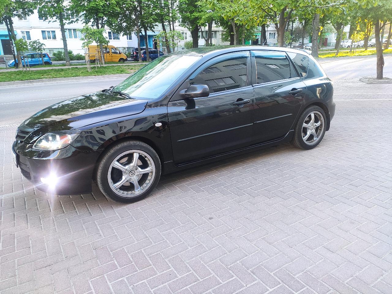 Mazda 3 - фото 1