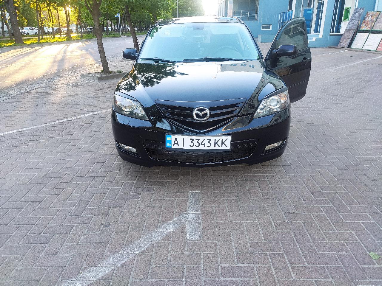 Mazda 3 - фото 3