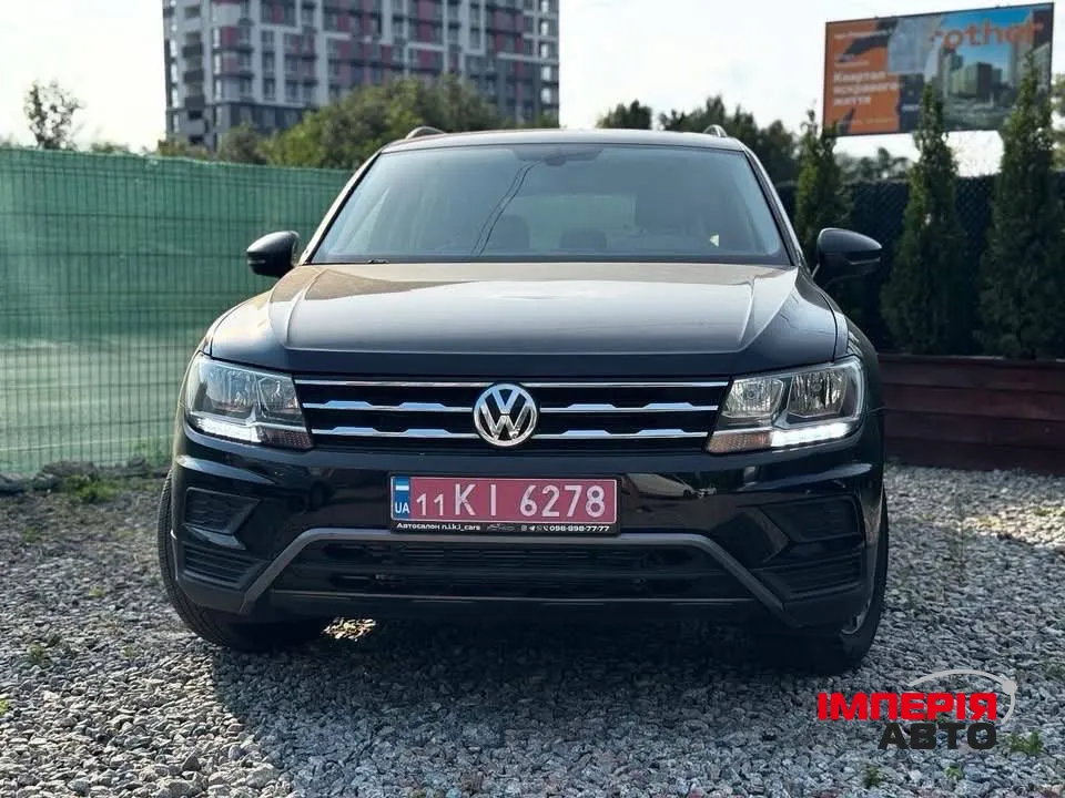 Volkswagen Tiguan - фото 1