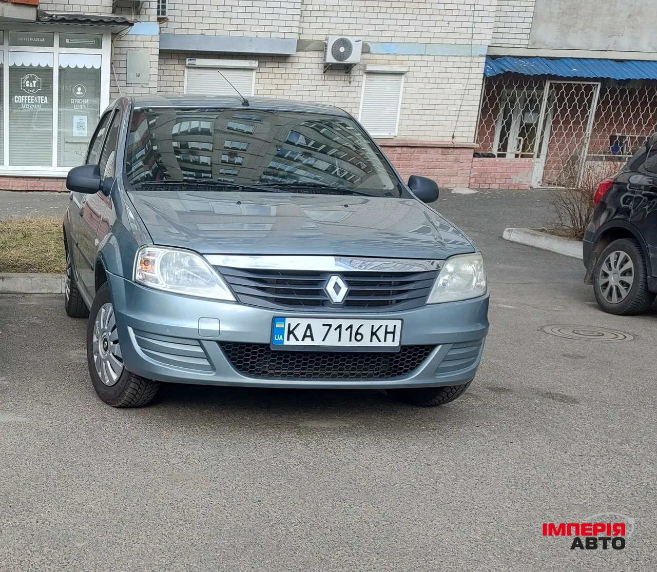 Renault Logan - фото 1