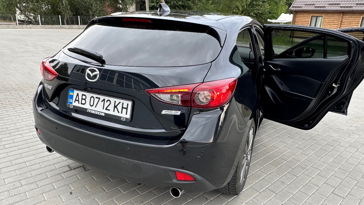 Mazda 3 - фото 14