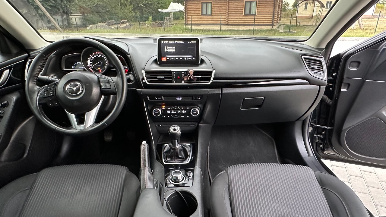 Mazda 3 - фото 6
