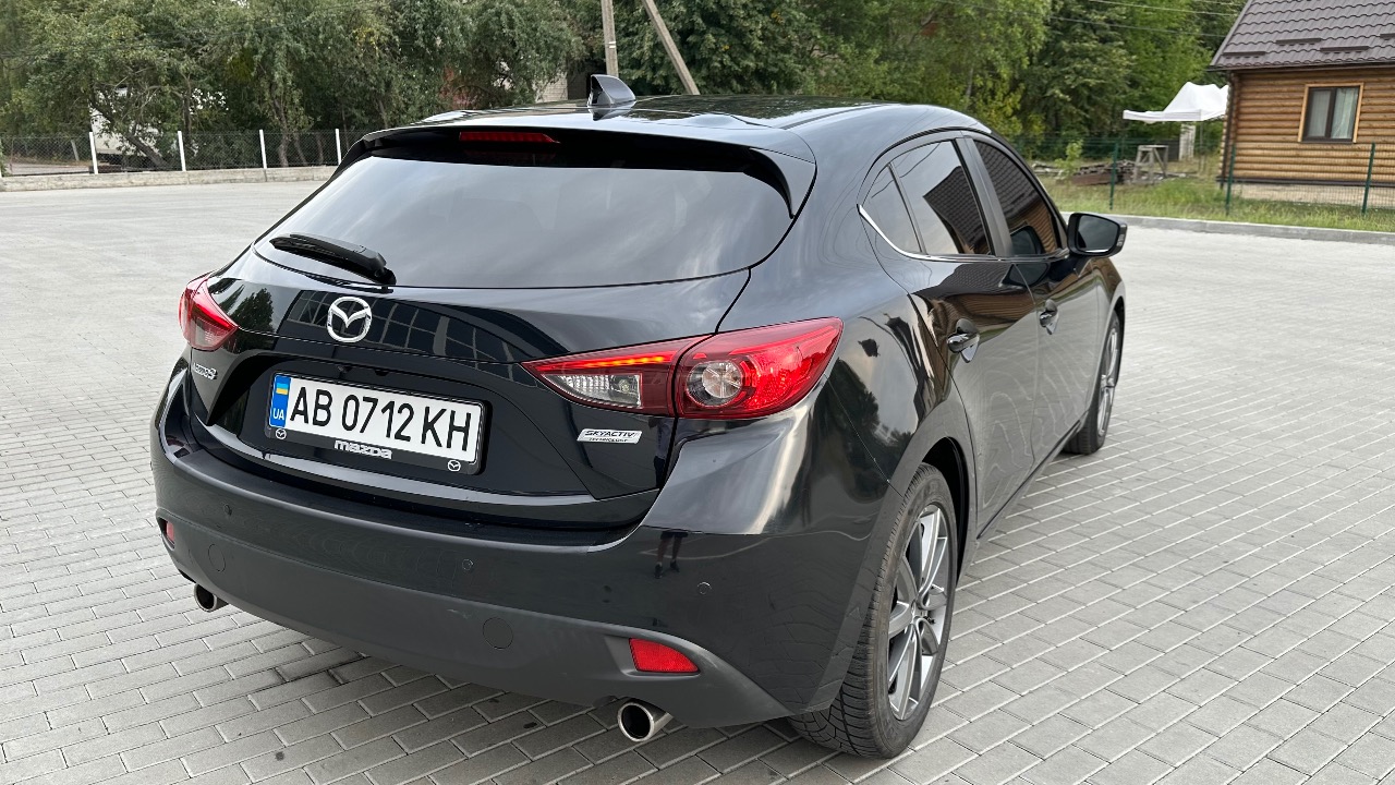 Mazda 3 - фото 13