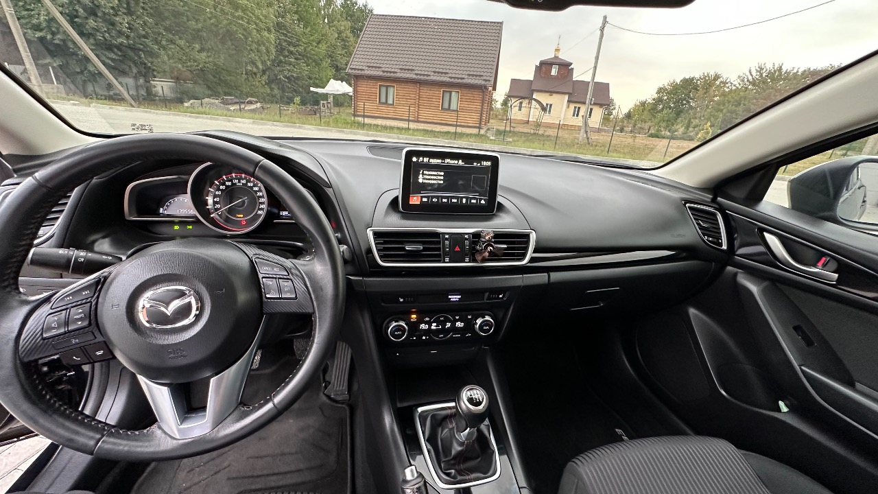 Mazda 3 - фото 11