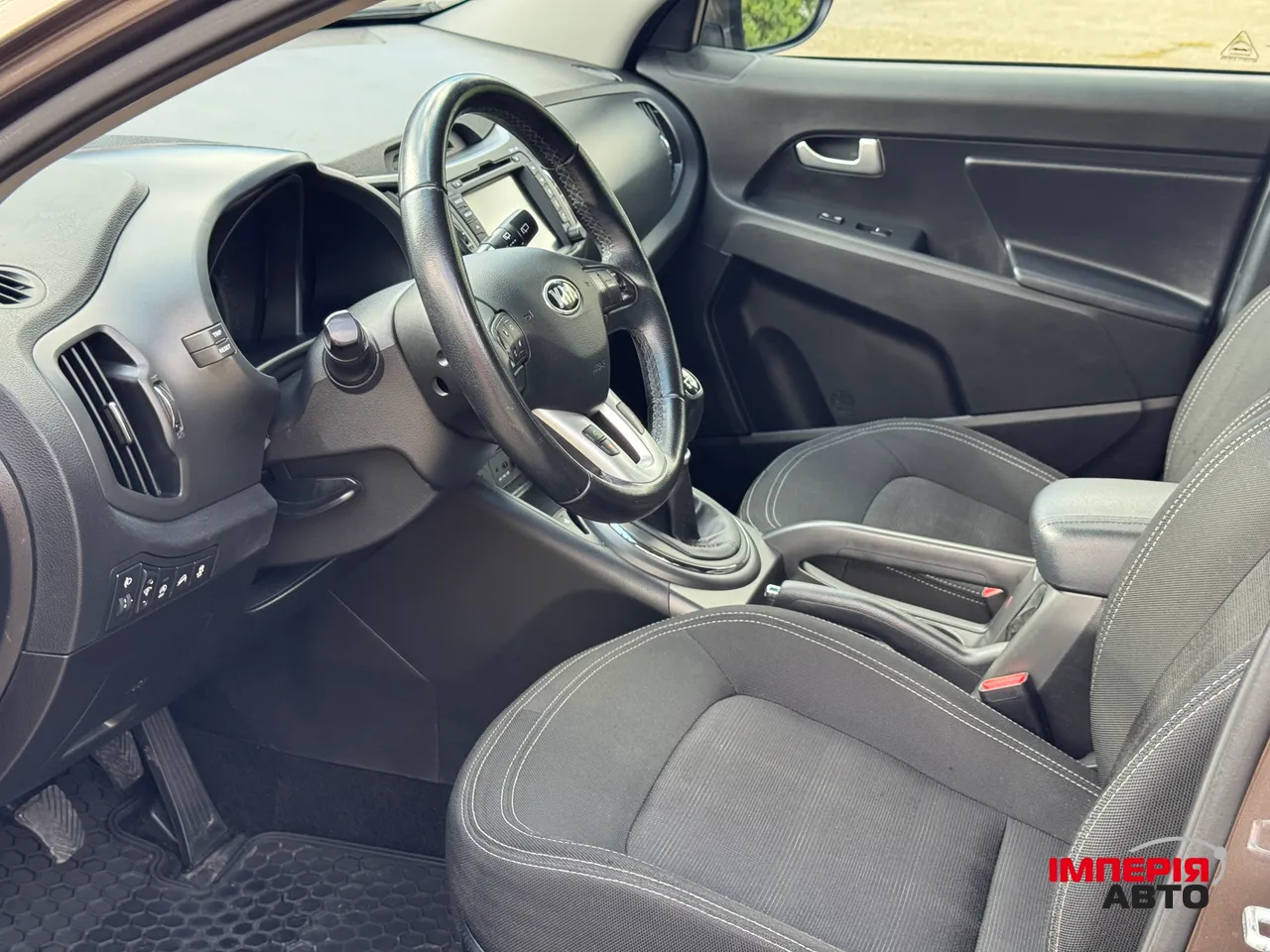 Kia Sportage - фото 12