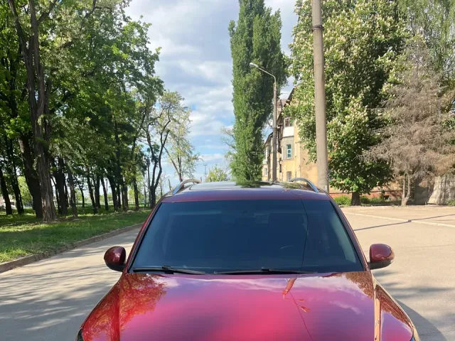 Volkswagen Tiguan - фото 1