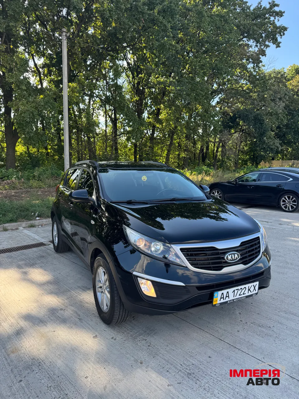 Kia Sportage - фото 1