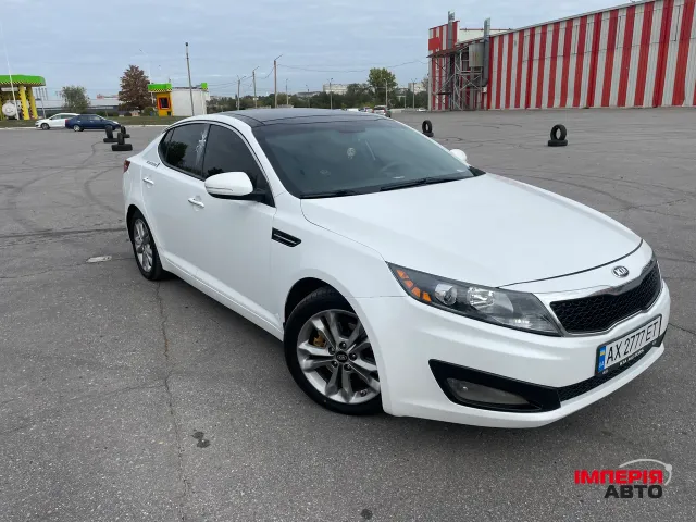 Kia Optima - фото 1