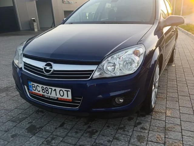 Opel Astra - фото 1