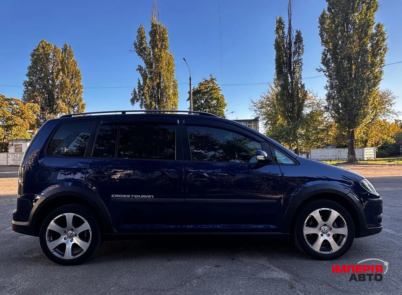 Volkswagen Touran - фото 7