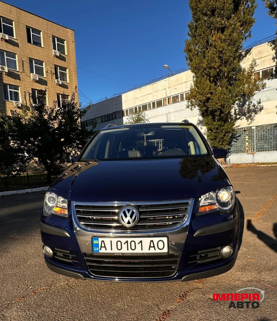 Volkswagen Touran - фото 3