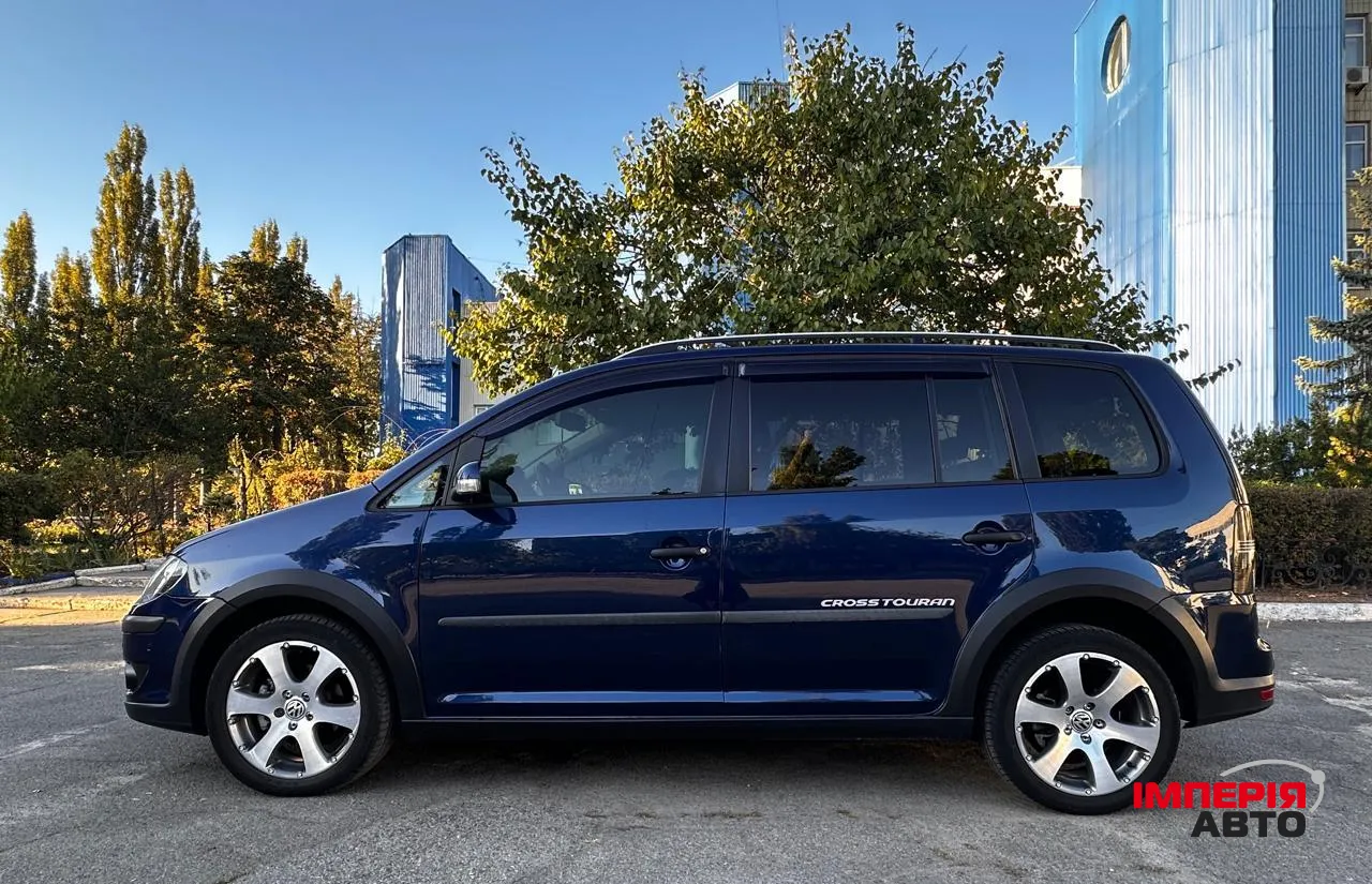 Volkswagen Touran - фото 6