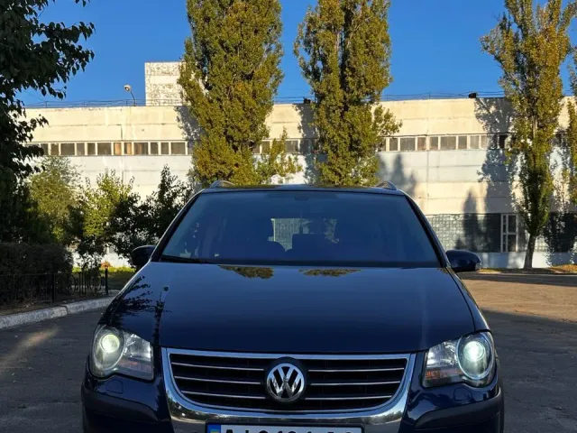 Volkswagen Touran - фото 5