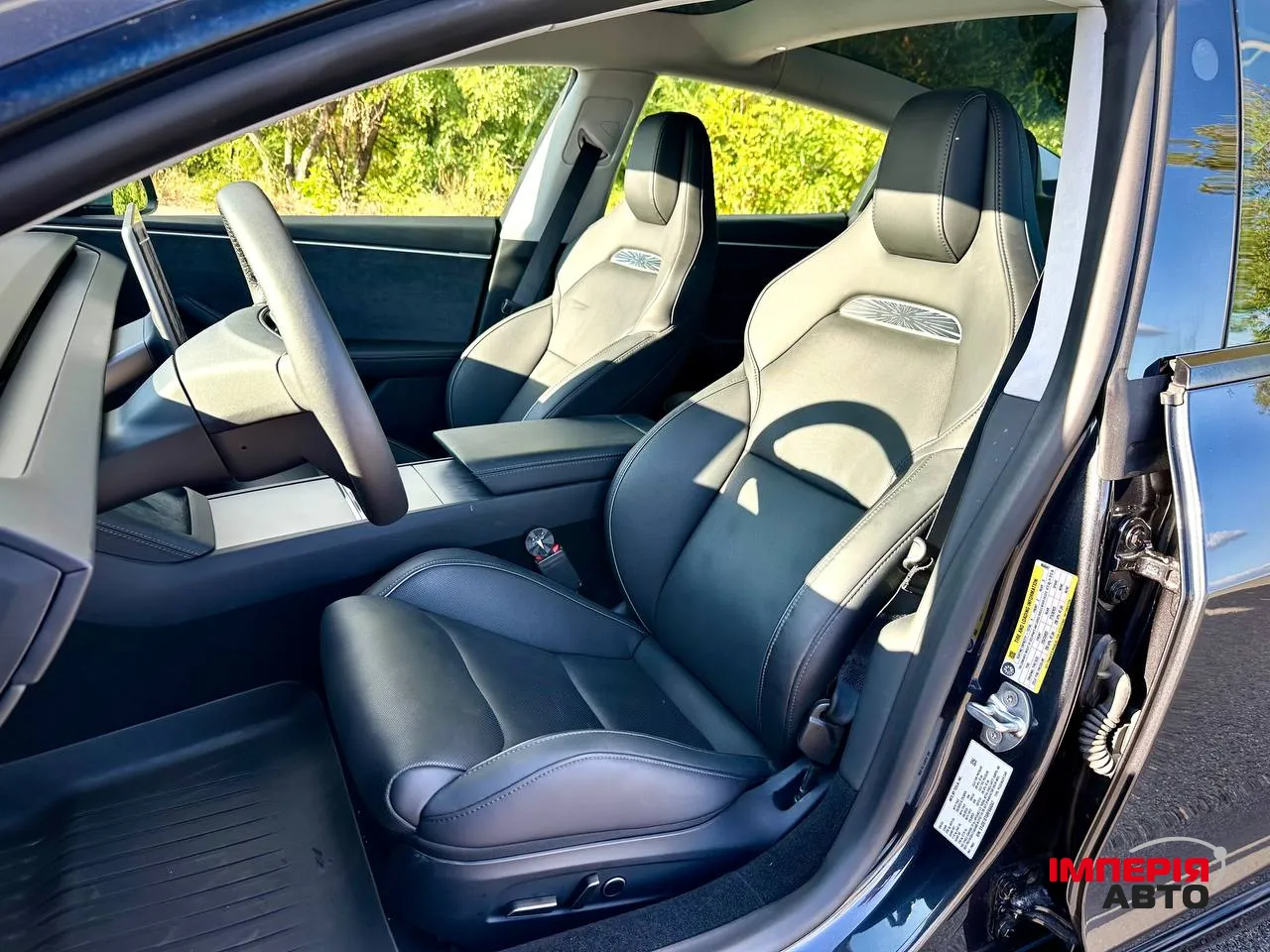 Tesla Model 3 - фото 12