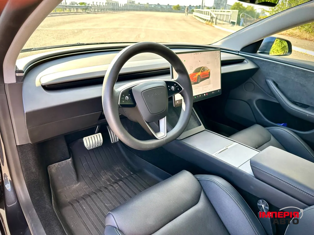 Tesla Model 3 - фото 11