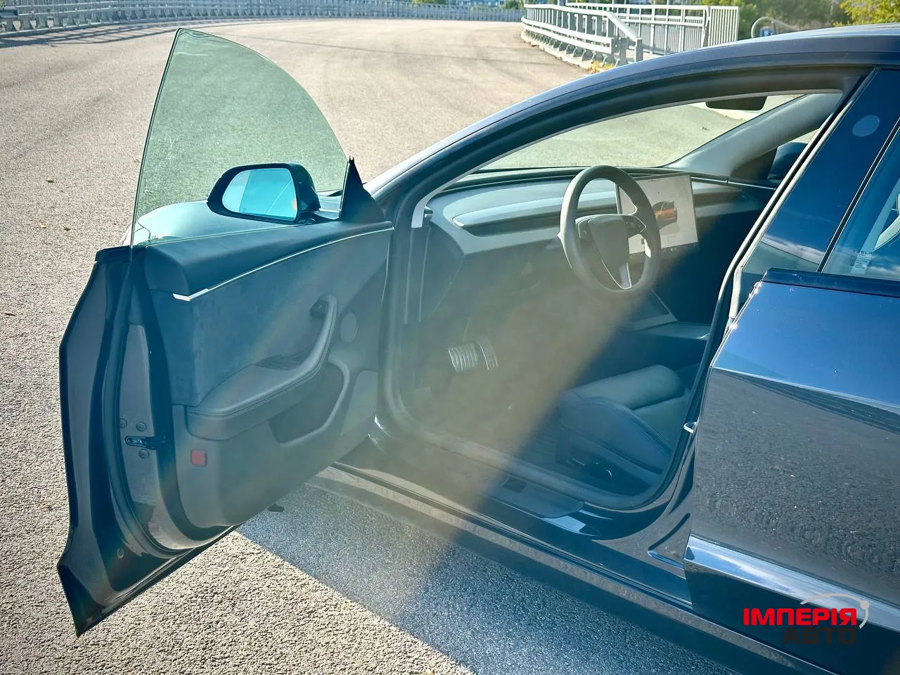 Tesla Model 3 - фото 10