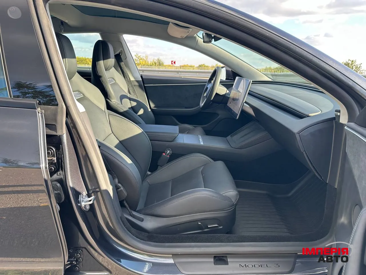 Tesla Model 3 - фото 18