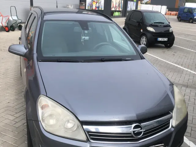 Opel Astra - фото 1