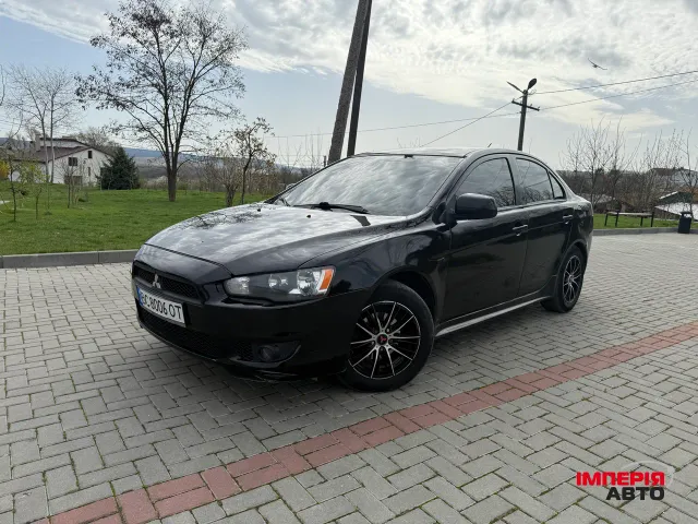 Mitsubishi Lancer - фото 1