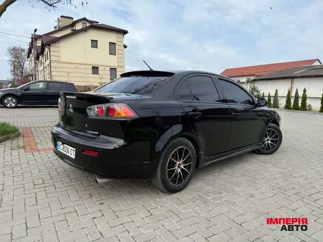 Mitsubishi Lancer - фото 3