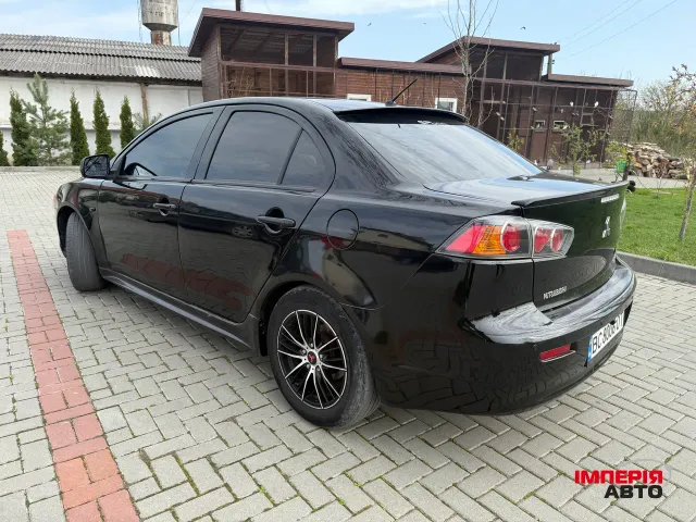 Mitsubishi Lancer - фото 4