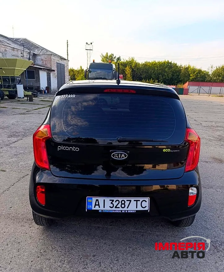 Kia Picanto - фото 5