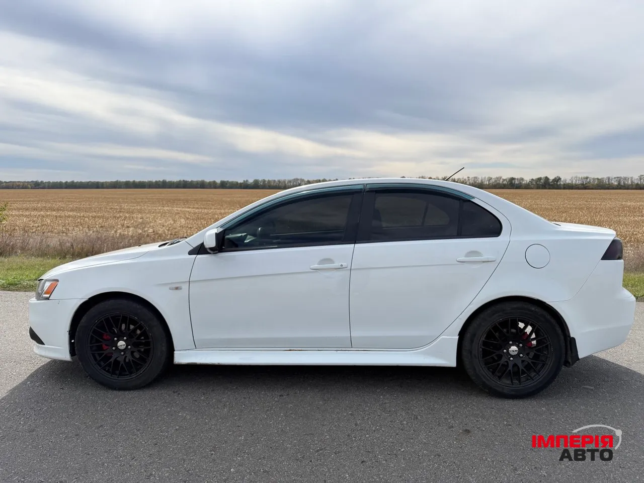 Mitsubishi Lancer - фото 7