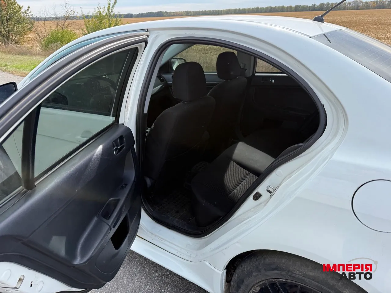Mitsubishi Lancer - фото 9