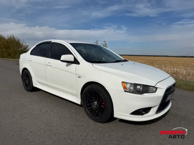 Mitsubishi Lancer - фото 1
