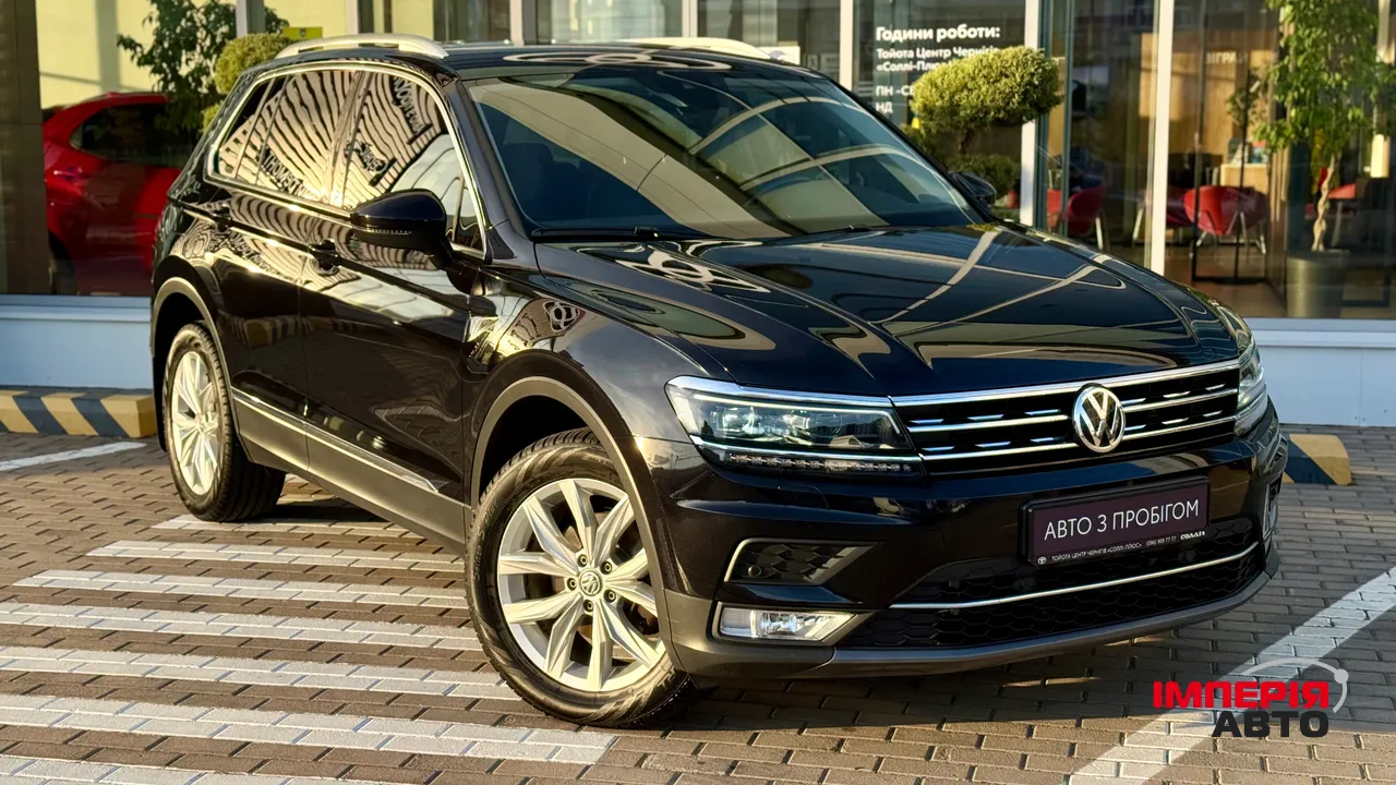 Volkswagen Tiguan - фото 11