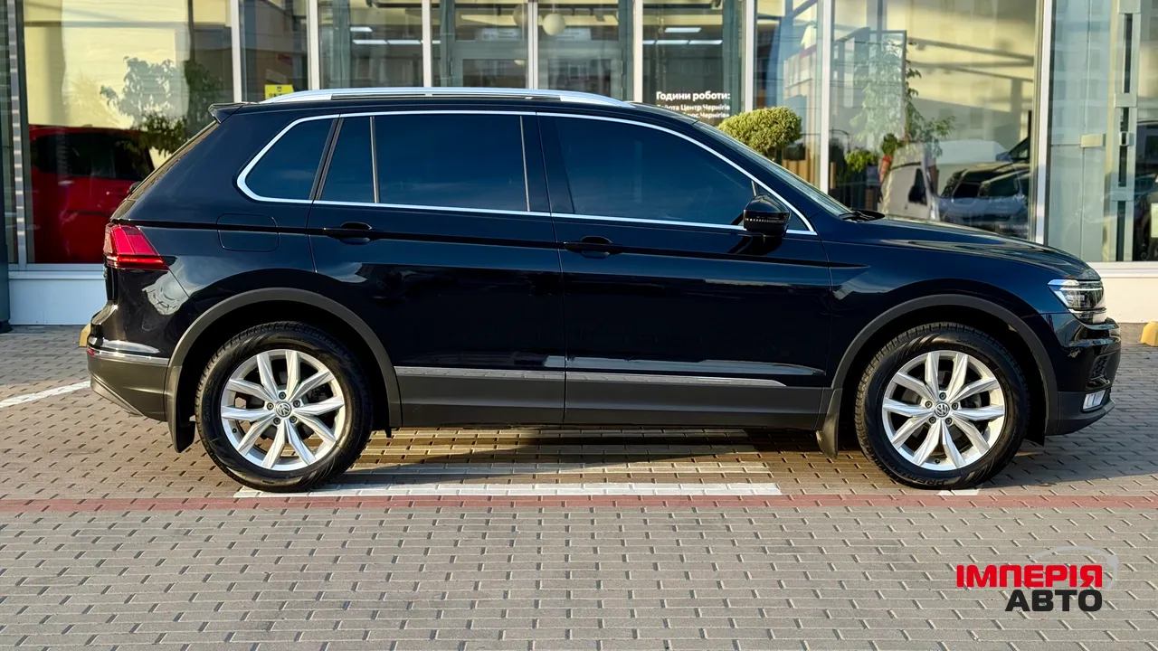 Volkswagen Tiguan - фото 9