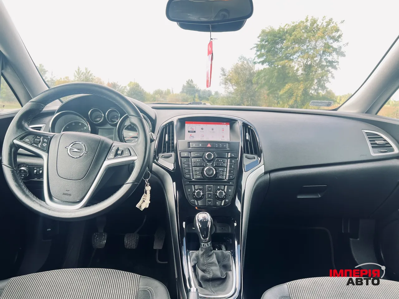 Opel Astra - фото 11