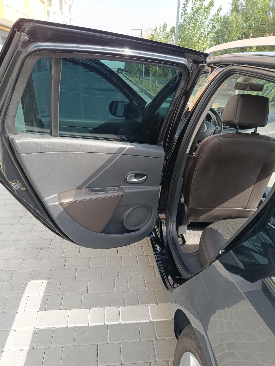 Renault Clio - фото 11