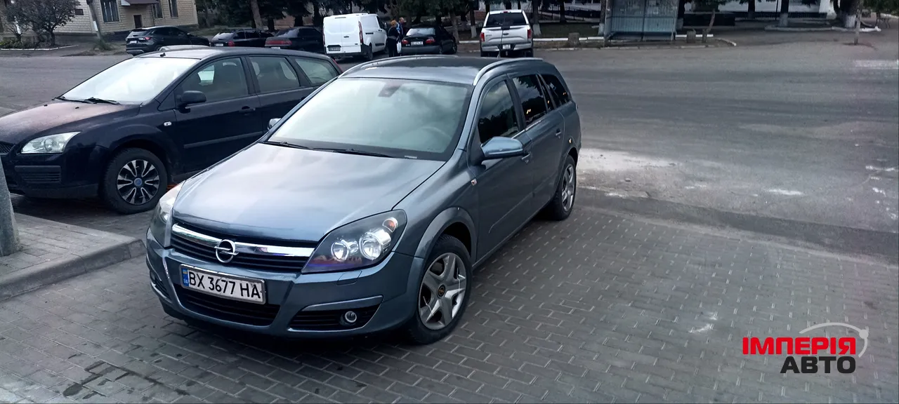 Opel Astra - фото 1