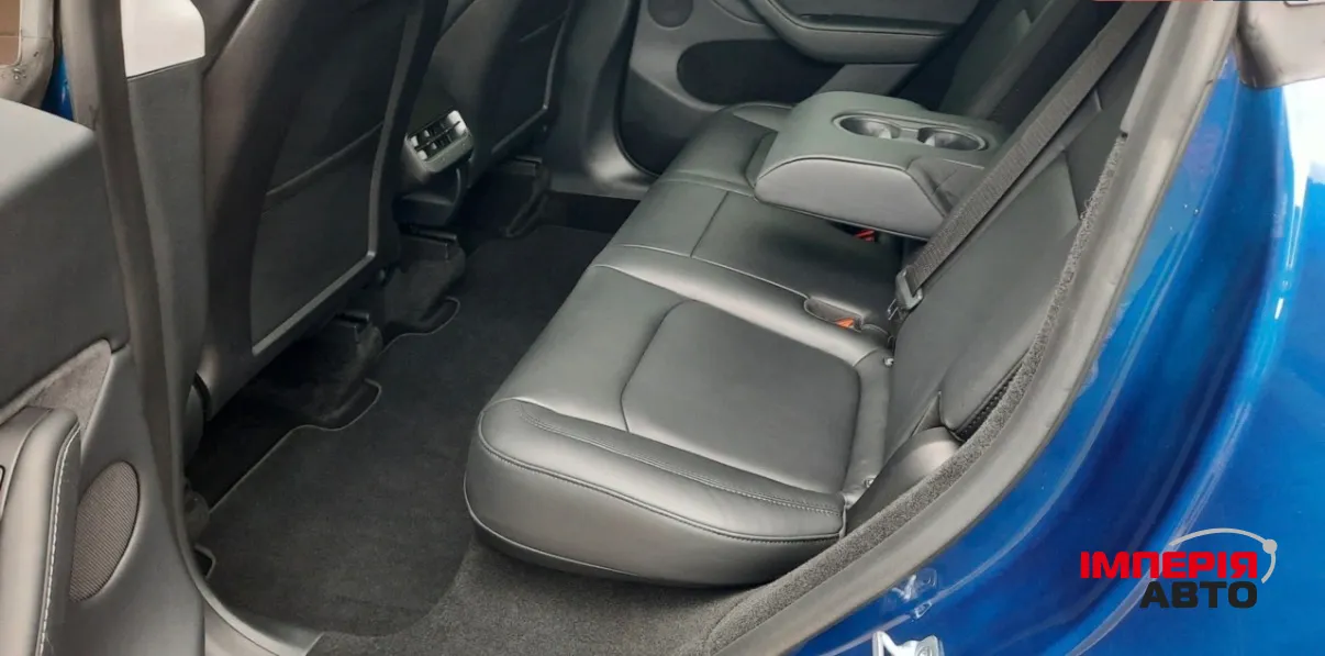 Tesla Model Y - фото 11