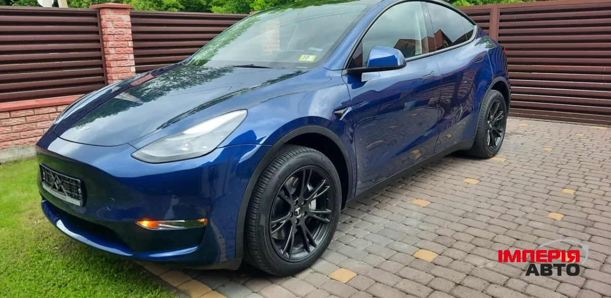 Tesla Model Y - фото 8