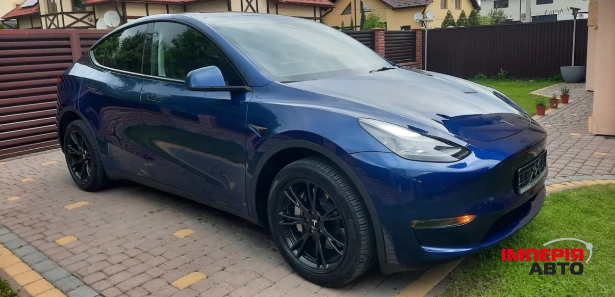 Tesla Model Y - фото 9