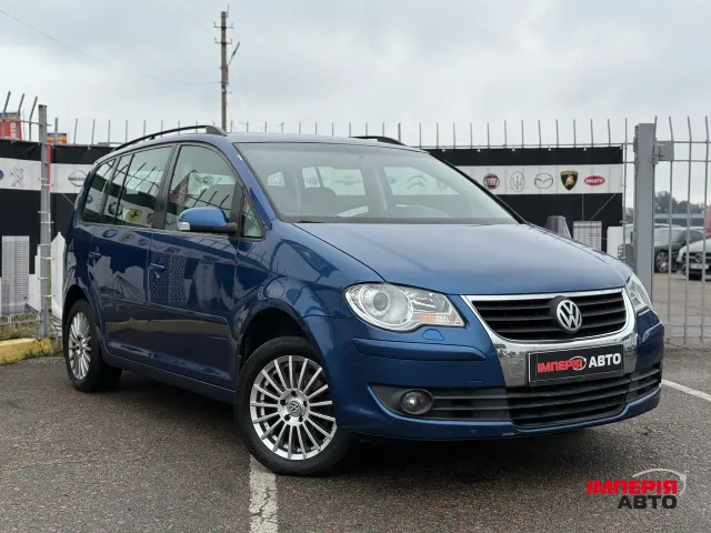 Volkswagen Touran - фото 5