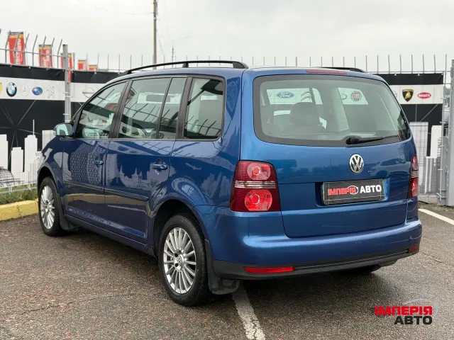 Volkswagen Touran - фото 2