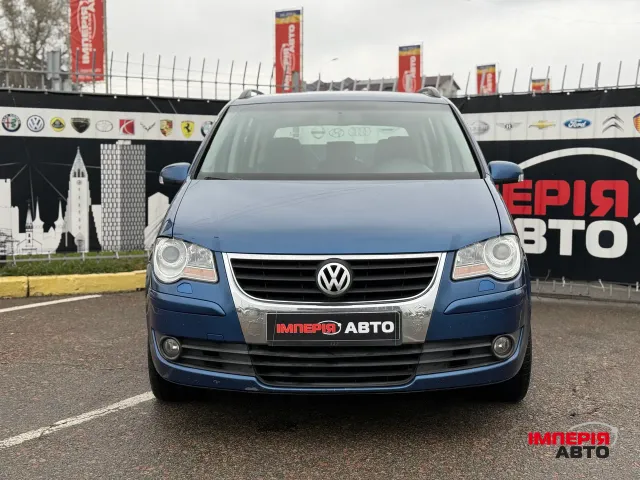 Volkswagen Touran - фото 3