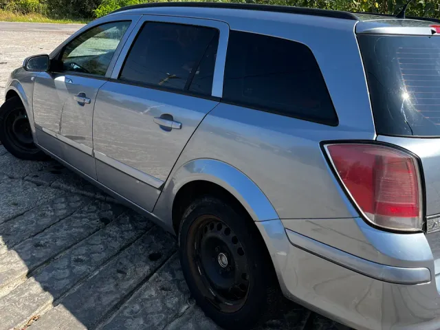 Opel Astra - фото 1