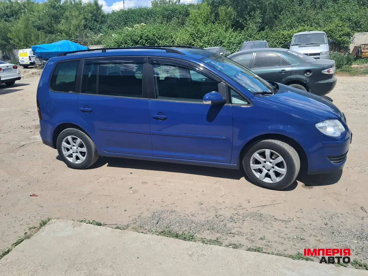 Volkswagen Touran - фото 3